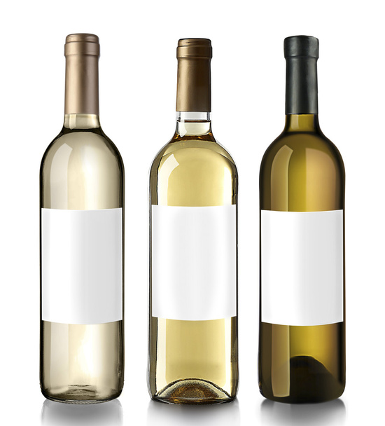 Bottles of white wine with empty labels - Foto, Imagen