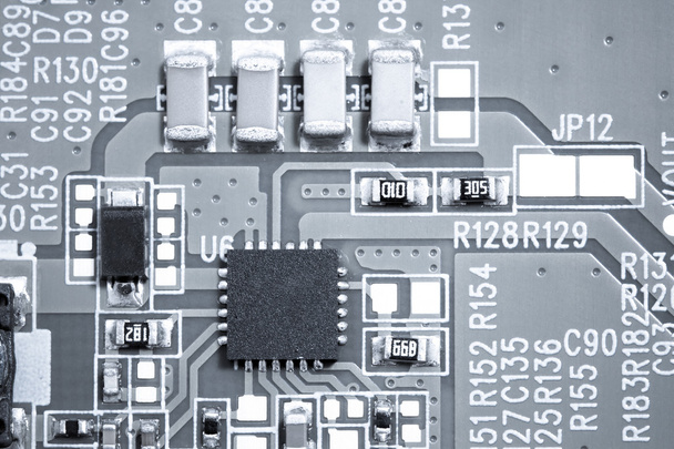 Circuit board with microchip closeup - Photo, image