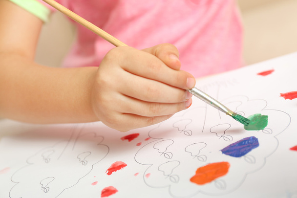 Child drawing with bright paints - Photo, Image
