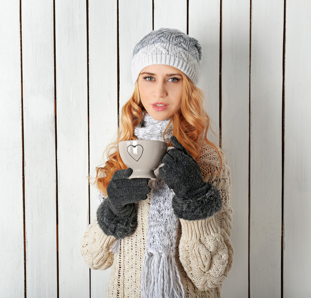 Winter portrait of young blond woman - 写真・画像