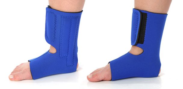 Foot with an ankle brace - Foto, afbeelding