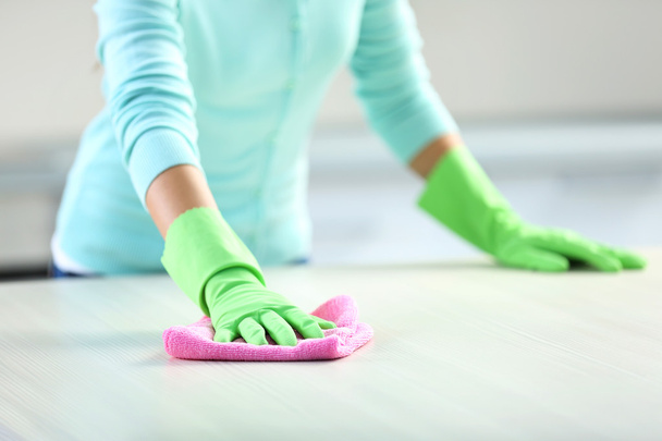 Woman in protective gloves cleaning  - Foto, Imagem