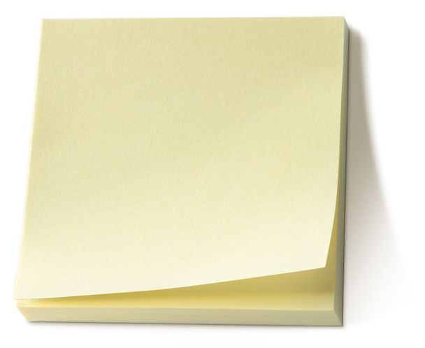 Yellow memo pad isolated on a white background - Photo, Image