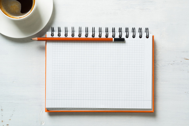 Coffee with blank notepad and pencil - Фото, зображення
