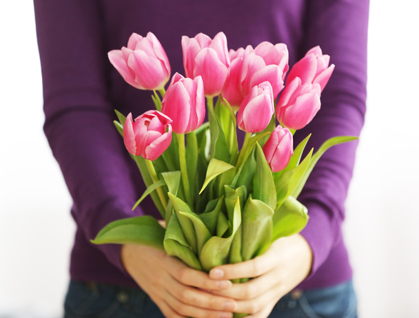 pink tulips in hands - Φωτογραφία, εικόνα