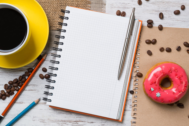 Opened notepad and cup of coffee - Fotoğraf, Görsel