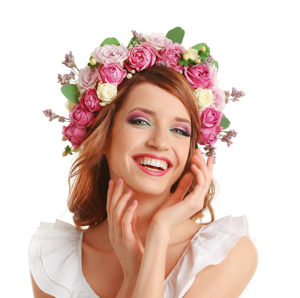 Beautiful young woman wearing floral headband isolated on white background - Valokuva, kuva