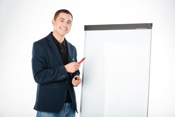 Businessman presenting something on whiteboard - Foto, Imagen