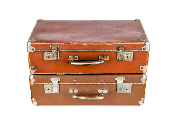 Старые потрепанные чемоданы
. - Фото, изображение