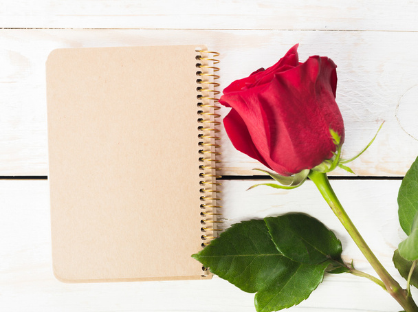 Red rose with notebook - Photo, image