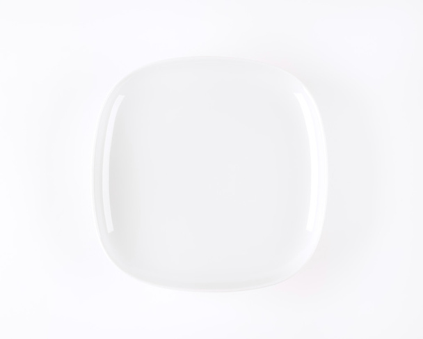 Белая квадратная тарелка - Фото, изображение
