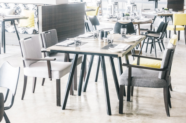 Empty chairs and tables in restaurant - Photo, Image