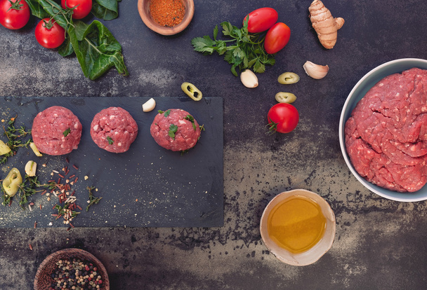 Raw meat balls and meat ball ingredients - Фото, зображення