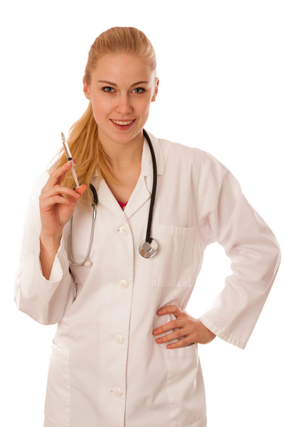 Doctor with stethoscope around neck and needle in hand promoting - Photo, Image