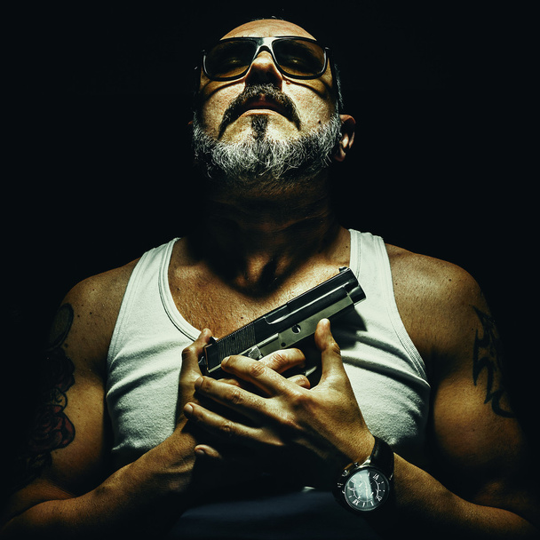 Man With The Gun  - Foto, afbeelding