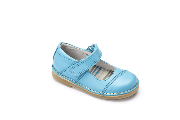 ярко-голубая обувь для детей на белом фоне
 - Фото, изображение