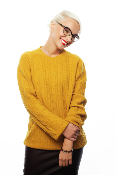 Young blond woman wearing yellow sweater - Foto, immagini