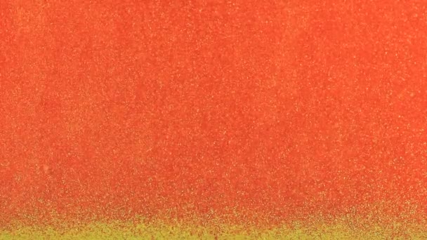 Glitter asentándose en imágenes de agua roja
 - Metraje, vídeo