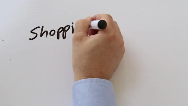 Schreiben einer Einkaufsliste auf Whiteboard - Filmmaterial, Video
