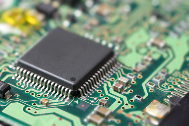 Electronic chip on circuit board - Foto, imagen