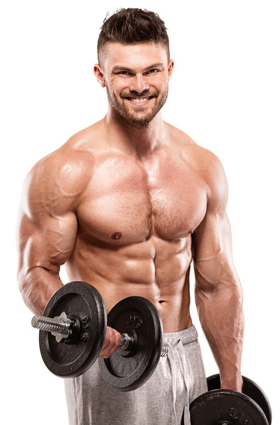 Musclé bodybuilder gars faire des exercices avec gros haltère
 - Photo, image
