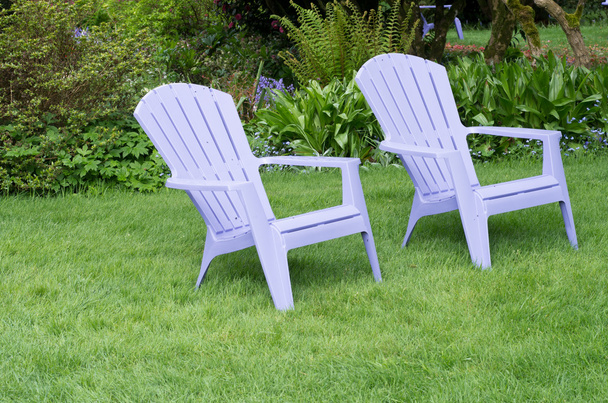 Purple chairs in a green lawn - Valokuva, kuva
