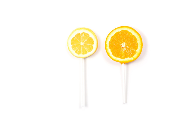 Lemon and orange like a lollipop - Foto, imagen