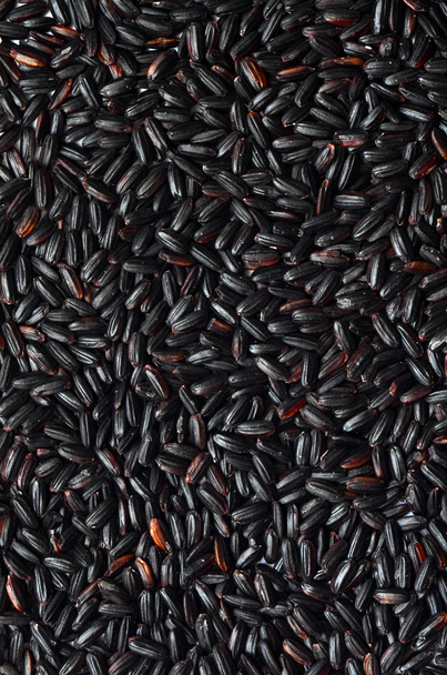 ungekochter schwarzer Reis - Foto, Bild
