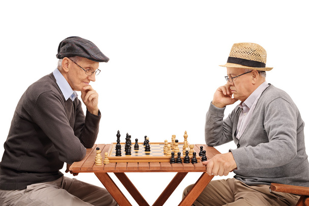 Two senior gentlemen playing chess  - Zdjęcie, obraz