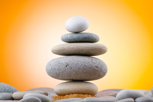 Balanced pebbles with colour background - Photo, Image