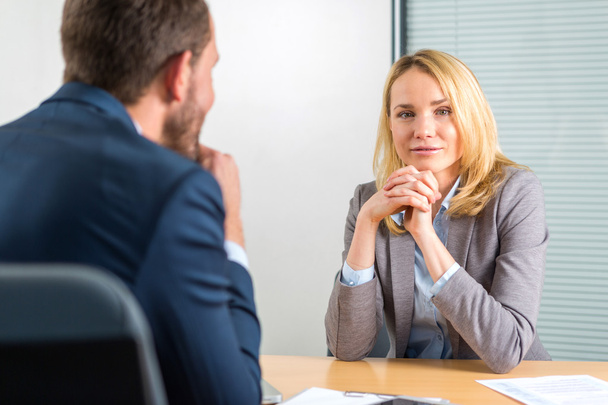 Young attractive woman during job interview - Foto, Bild