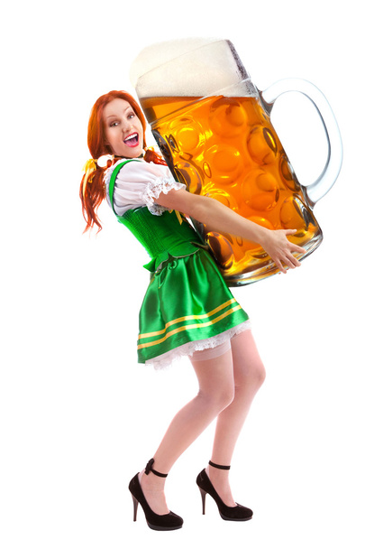 Happy Woman in Traditional Costume  Holding  a Giant Beer Glass  - Fotó, kép