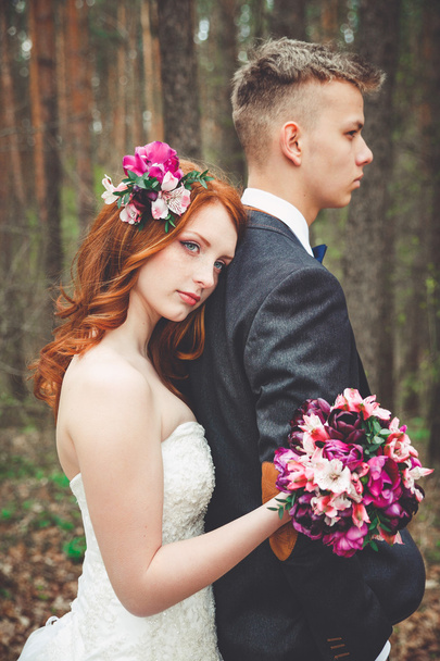 Bride and groom at wedding Day walking Outdoors on spring nature - Fotografie, Obrázek