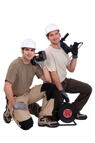 Duo of proud electricians - 写真・画像