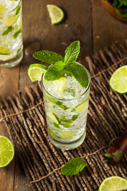 Homemade Alcoholic Mojito with LIme - 写真・画像