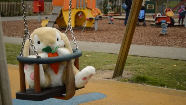 bunny toy in the swing - Footage, Video