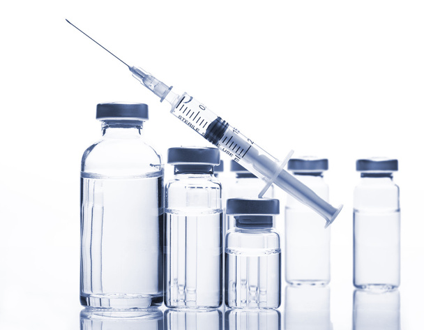 Glass Medicine Vials and Syringe on white background - Fotografie, Obrázek