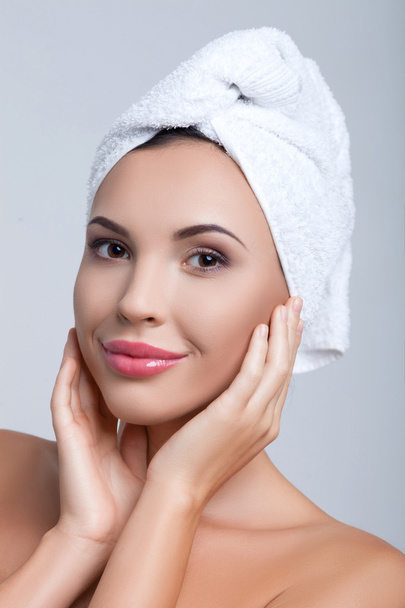 Cute young woman receiving skincare treatment - Photo, image