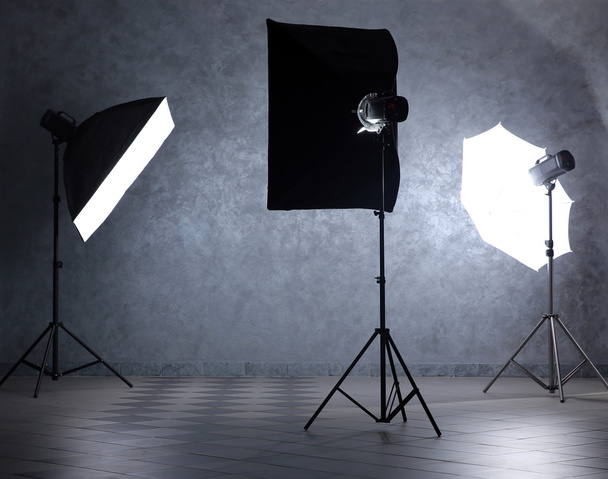Photo studio with lighting equipment - Фото, изображение