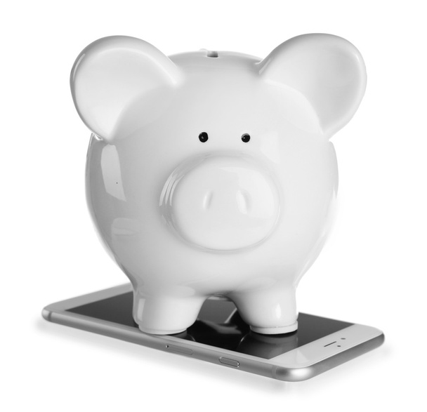 Piggy bank on mobile phone - Zdjęcie, obraz
