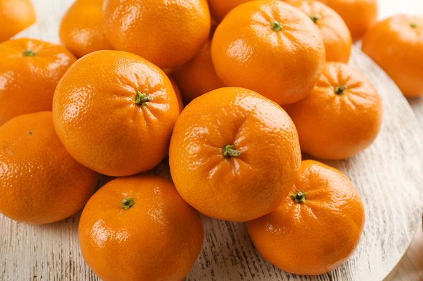 Delicious tangerines on  wooden board - Fotografie, Obrázek