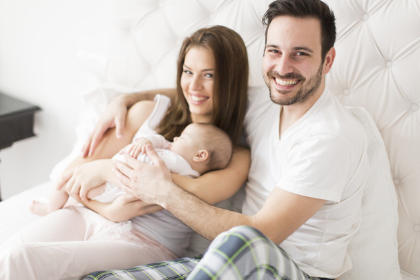 glückliche Familie mit Baby - Foto, Bild