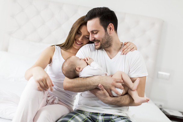 glückliche Familie mit Baby - Foto, Bild
