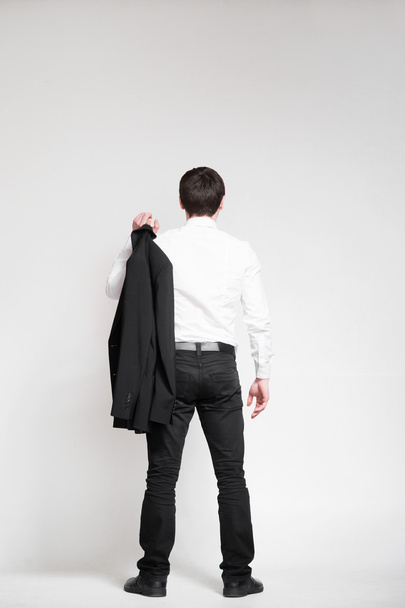 Businessman looking on an empty wall - Photo, image