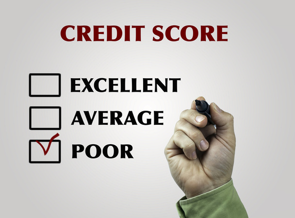 Käsi merkki kirjallisesti Credit Score käsite
 - Valokuva, kuva