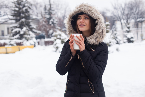 Winter, woman and hot beverage - Фото, зображення