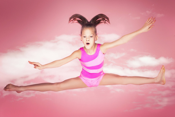 Happy gymnastic girl. - Zdjęcie, obraz