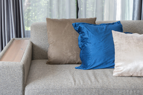 pillows on grey sofa in modern living room  - Foto, imagen