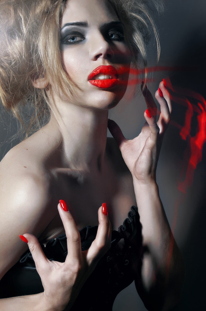 Portrait of young gothic girl with red lips and nails - Fotografie, Obrázek