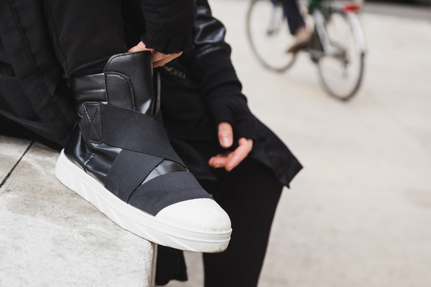 Detail of shoes of a man posing in the street - Fotoğraf, Görsel